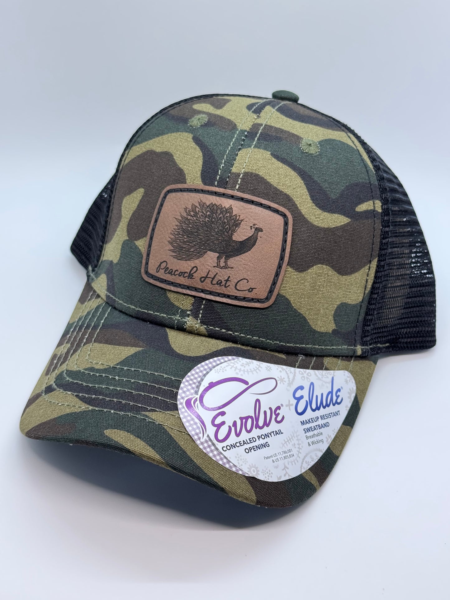 Peacockin’ Women’s Infinity Ponytail Trucker Hat